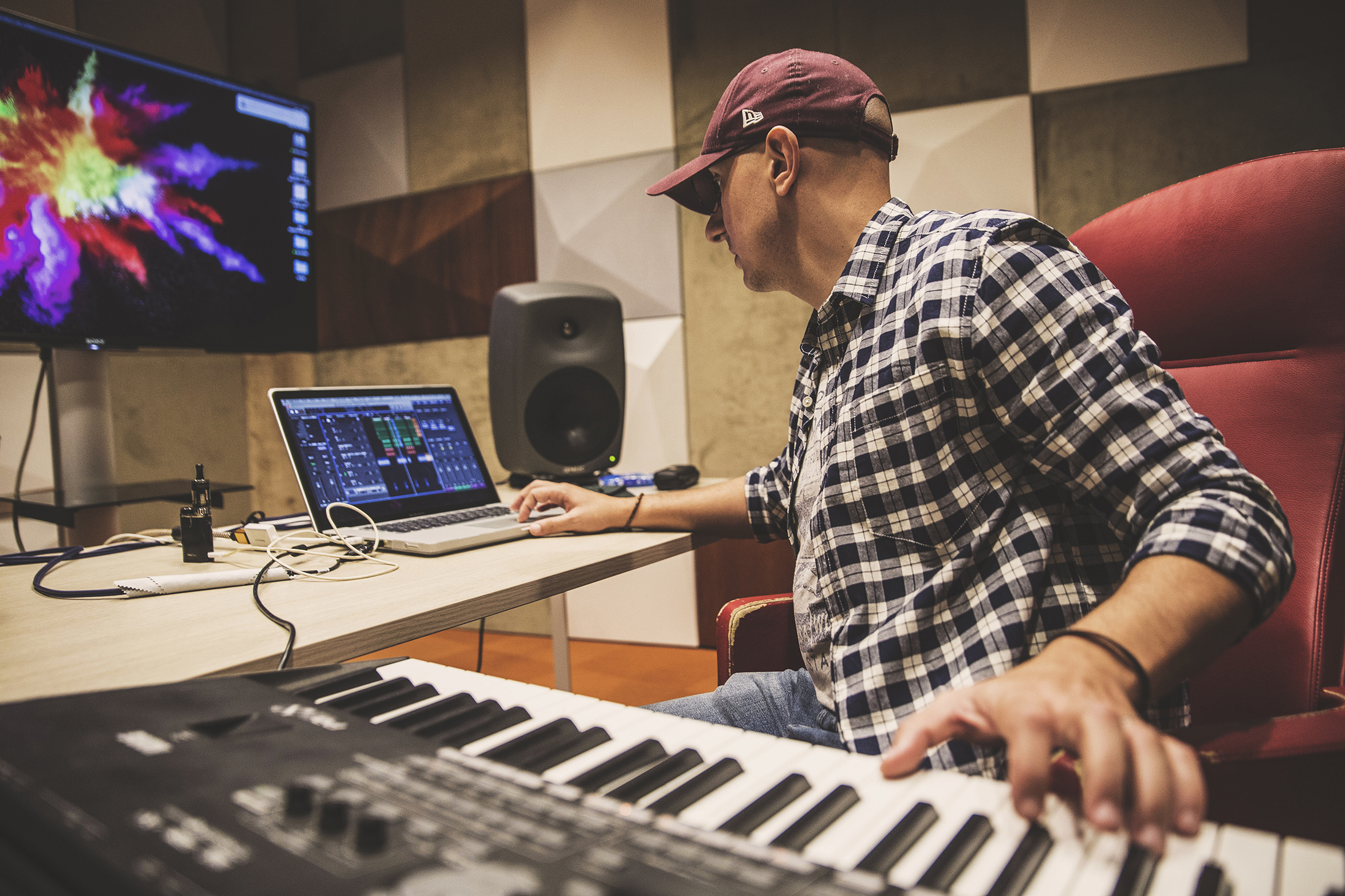 DJ Khalid Music composing on keyboard in studio